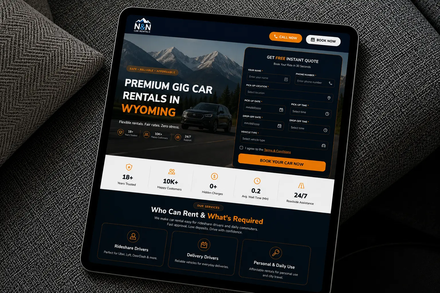 Car rental website design for Wyoming rental business shown on laptop and phone